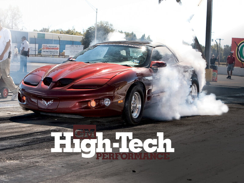 Red Drag Car Burning Tire