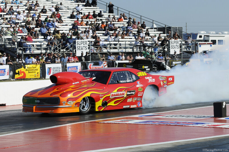 Red Drag Racing Car — Dynamic, Afternoon, Photograph, Crowd, Smoke