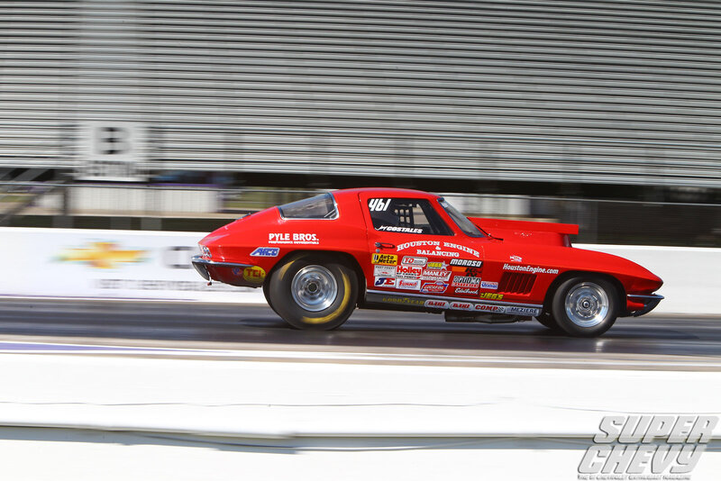 Red Drag Racing Car — Dynamic, Afternoon, Photograph, Race Track, Safety Barrier