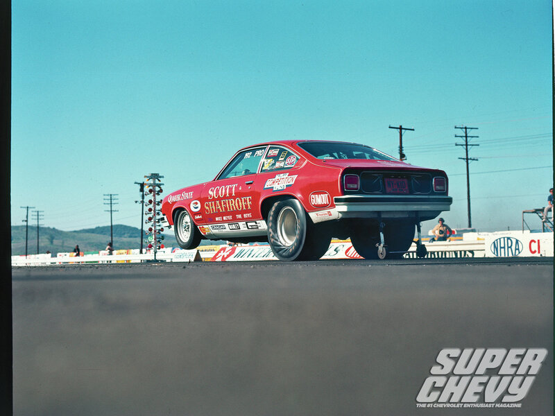 Red Drag Racing Car — Dynamic, Afternoon, Photograph, Race Track, Spectators