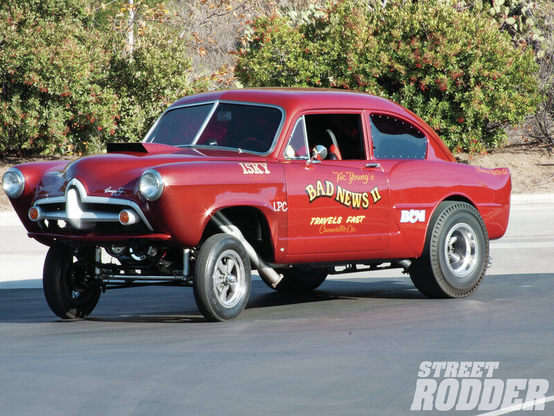 Red Drag Racing Car — Dynamic, Afternoon, Photograph, Trees