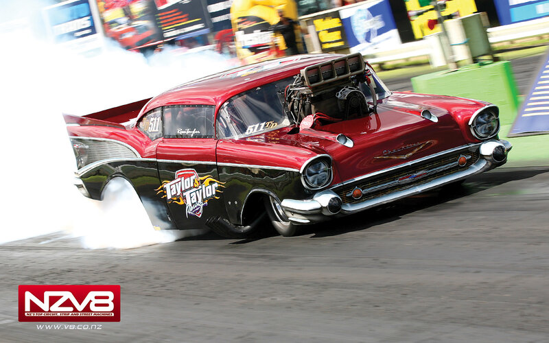 Red drag racing car on track