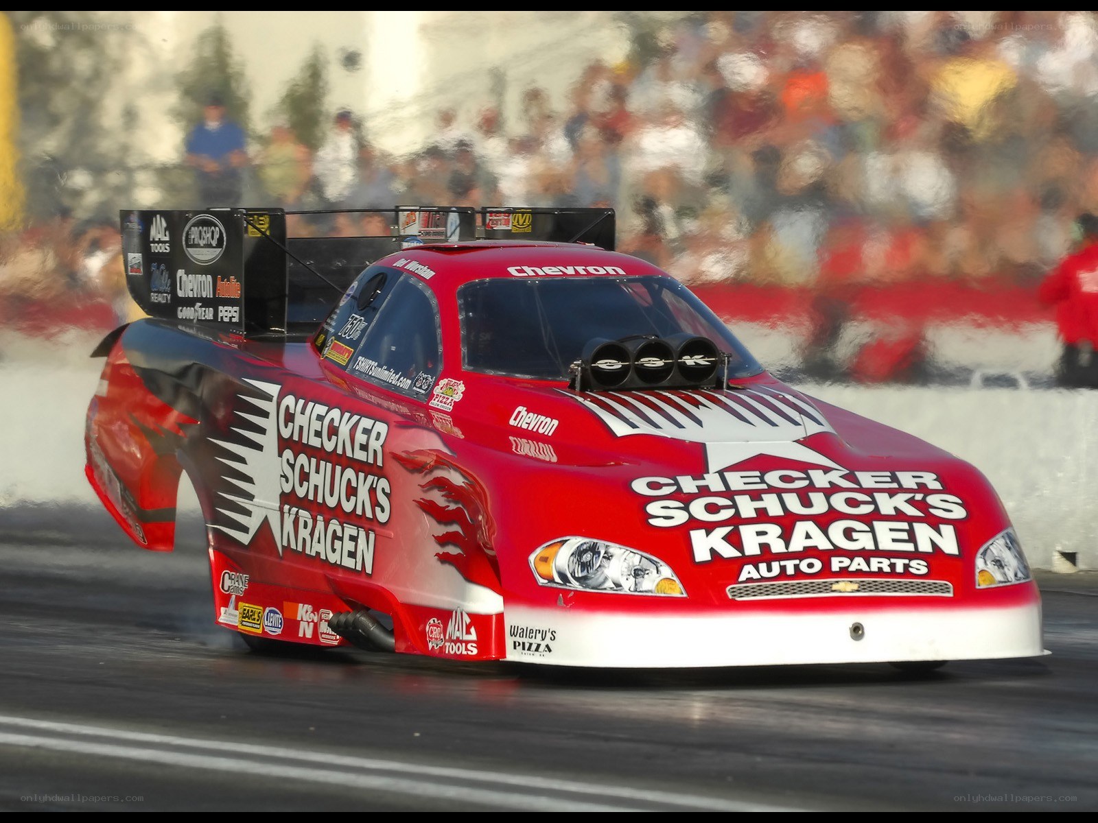 Red drag racing car on track