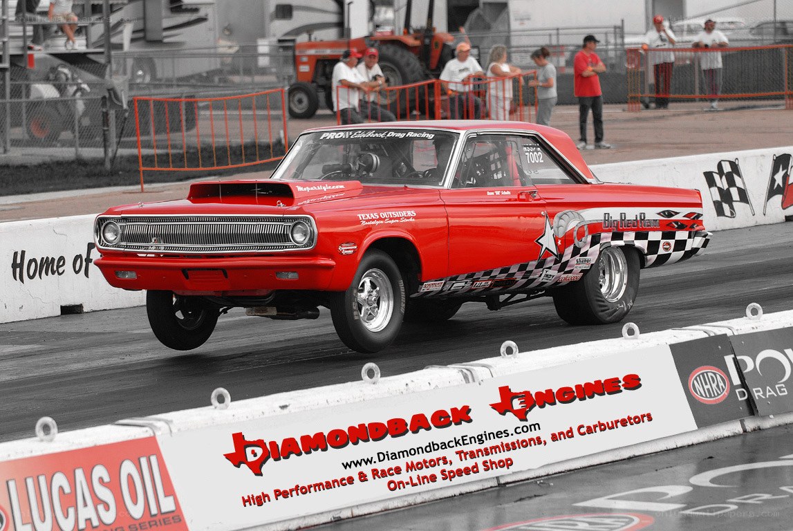 red drag racing car on track