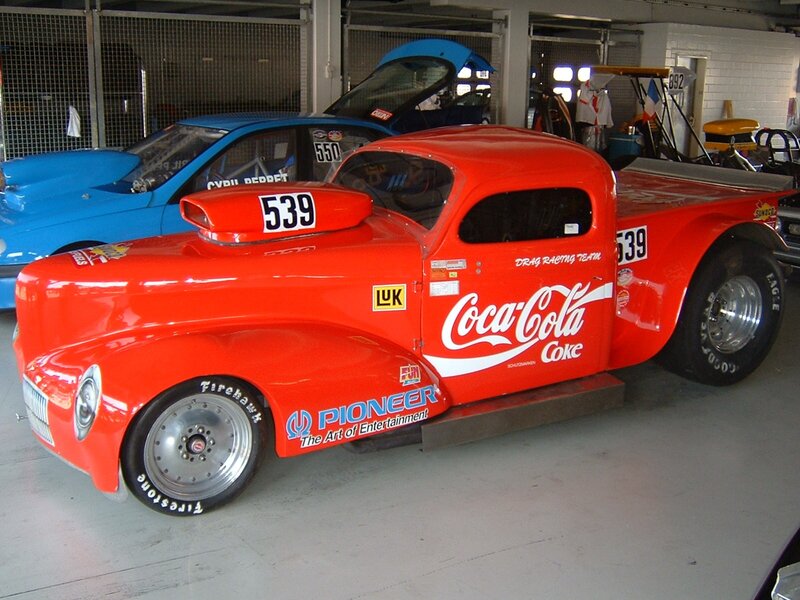 Red drag racing pickup truck