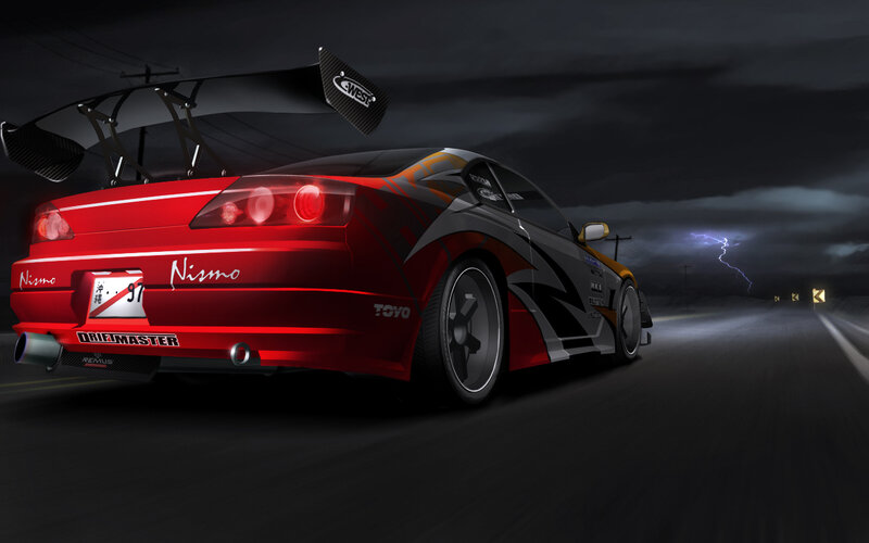 red drift car at night