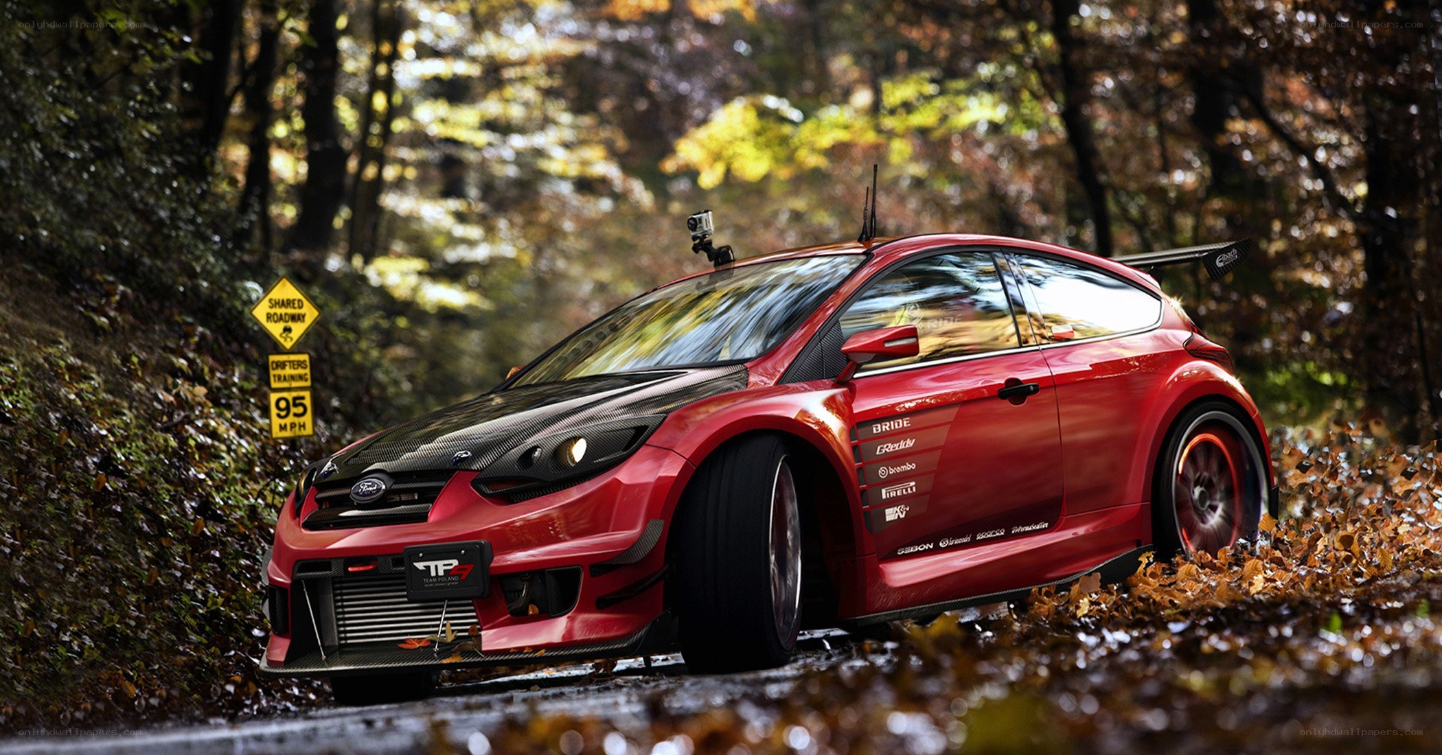 Red drift car in autumn forest