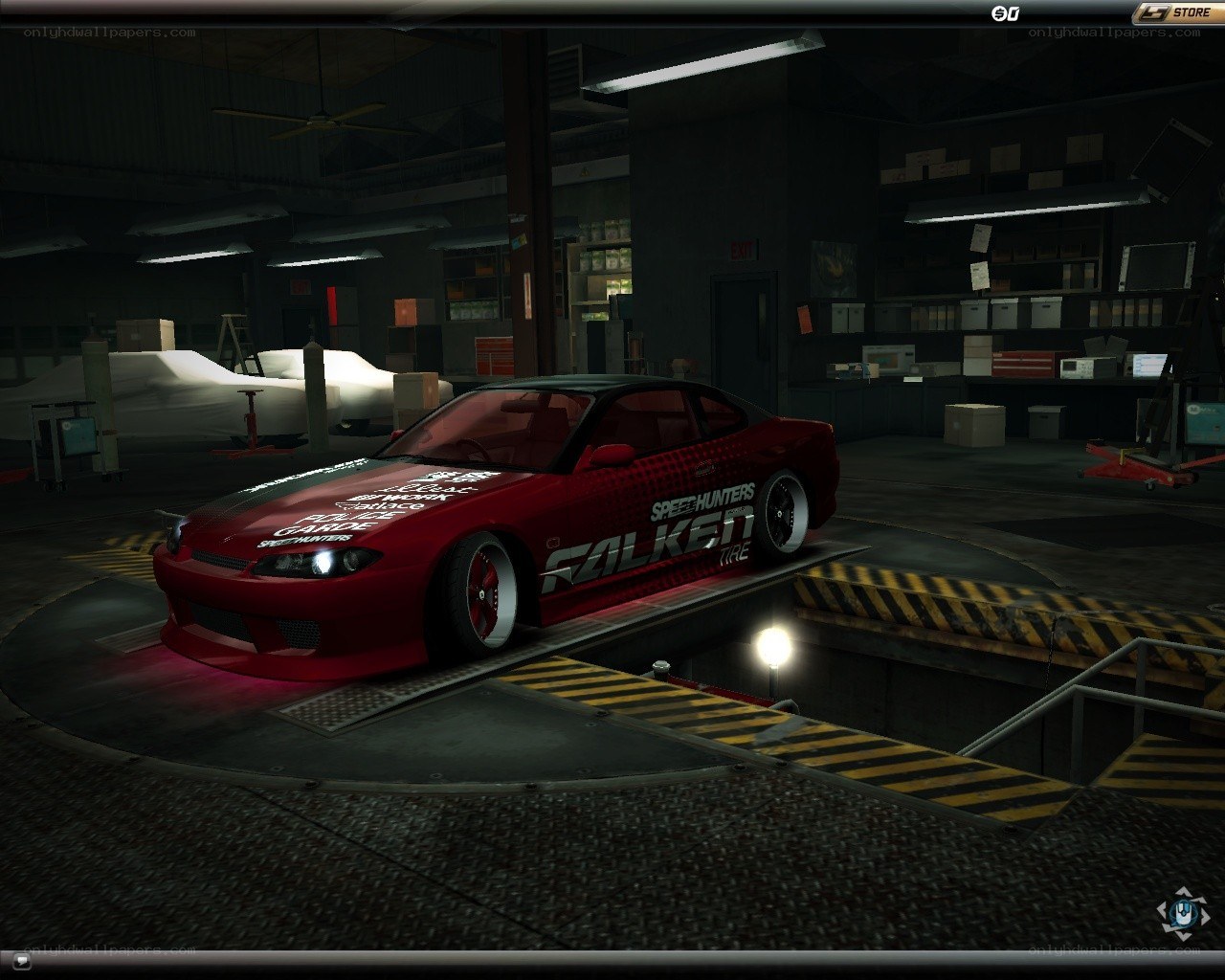 red drift car in garage