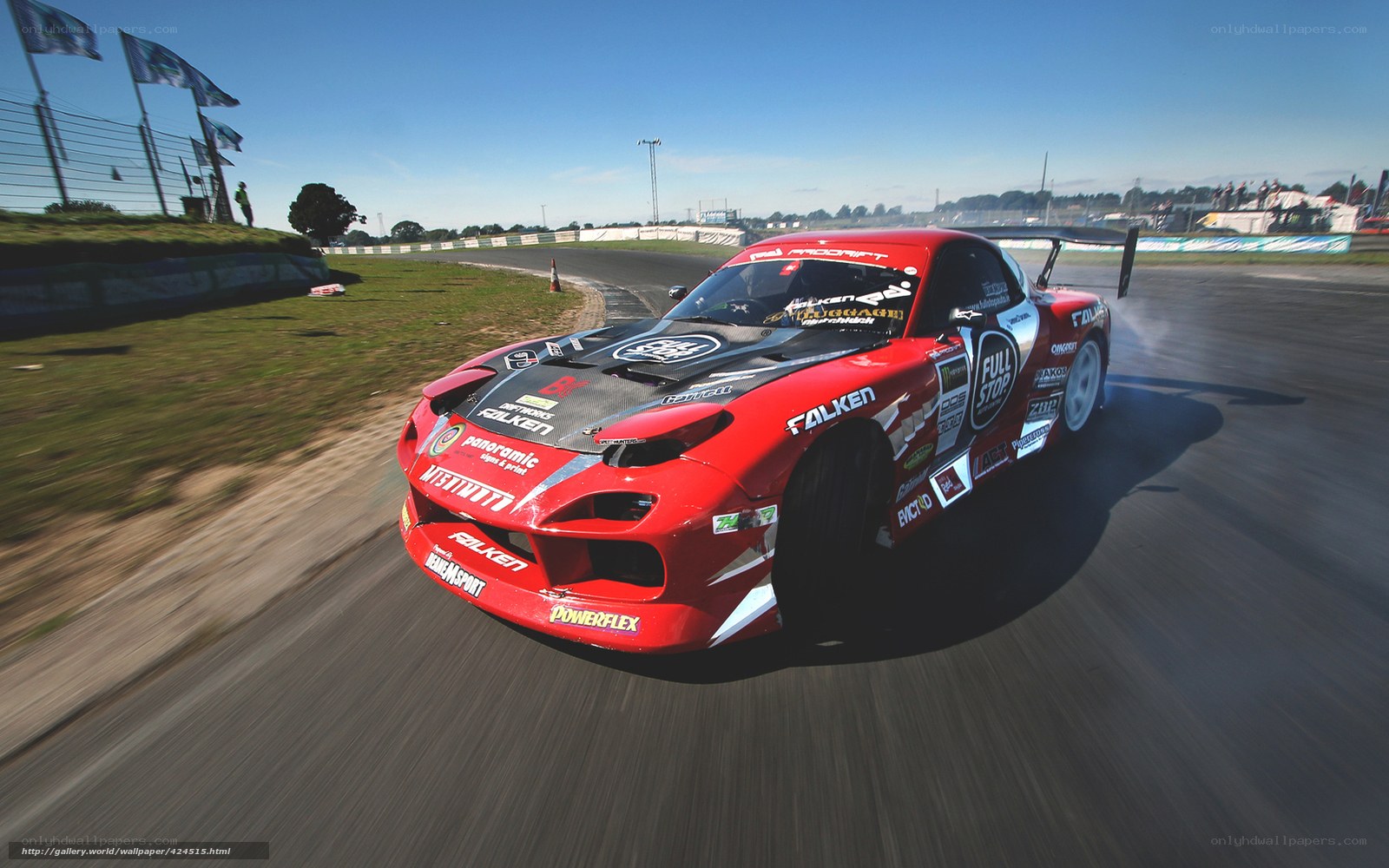 Red drift car on racetrack