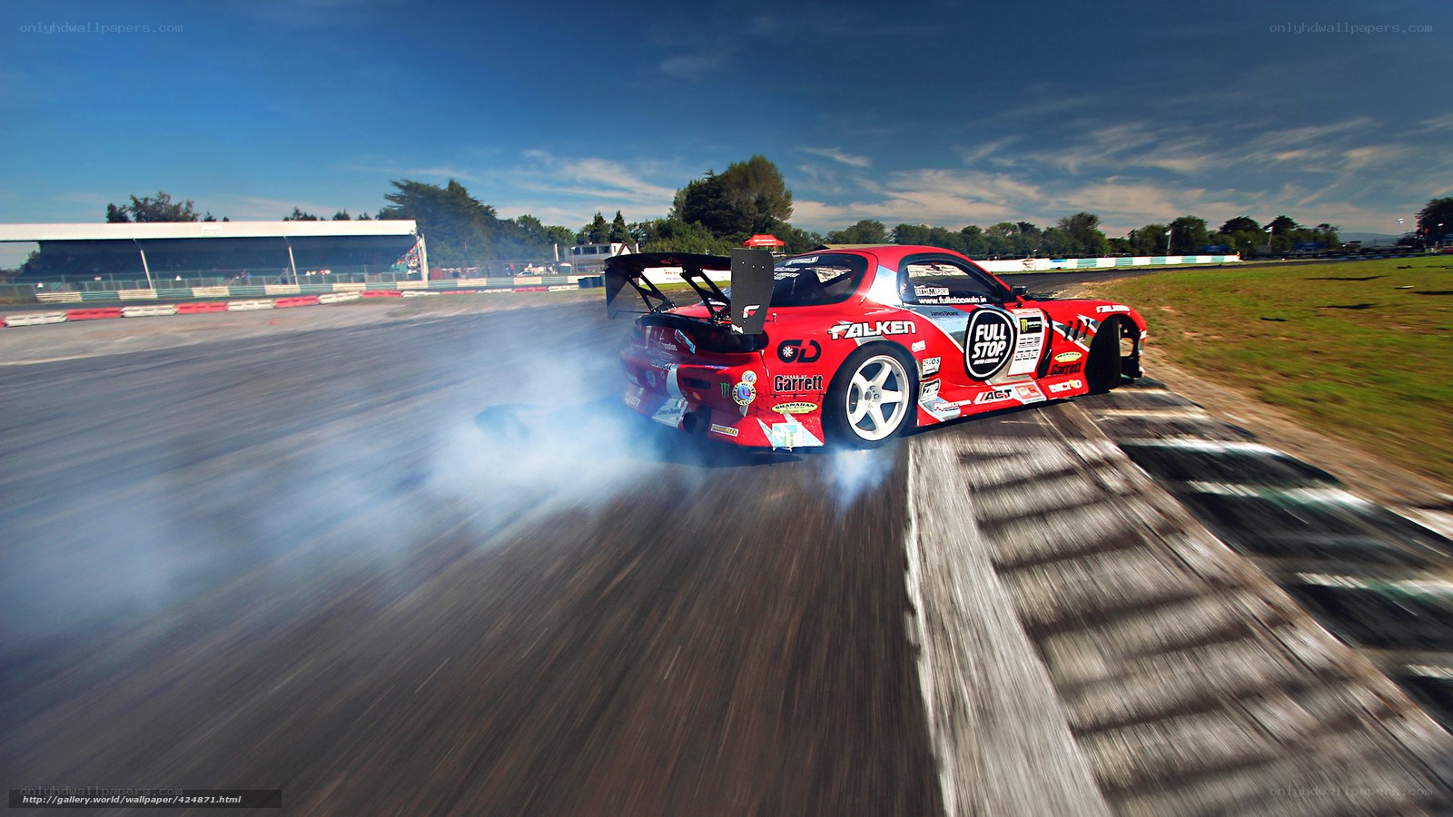 Red drift car on racetrack