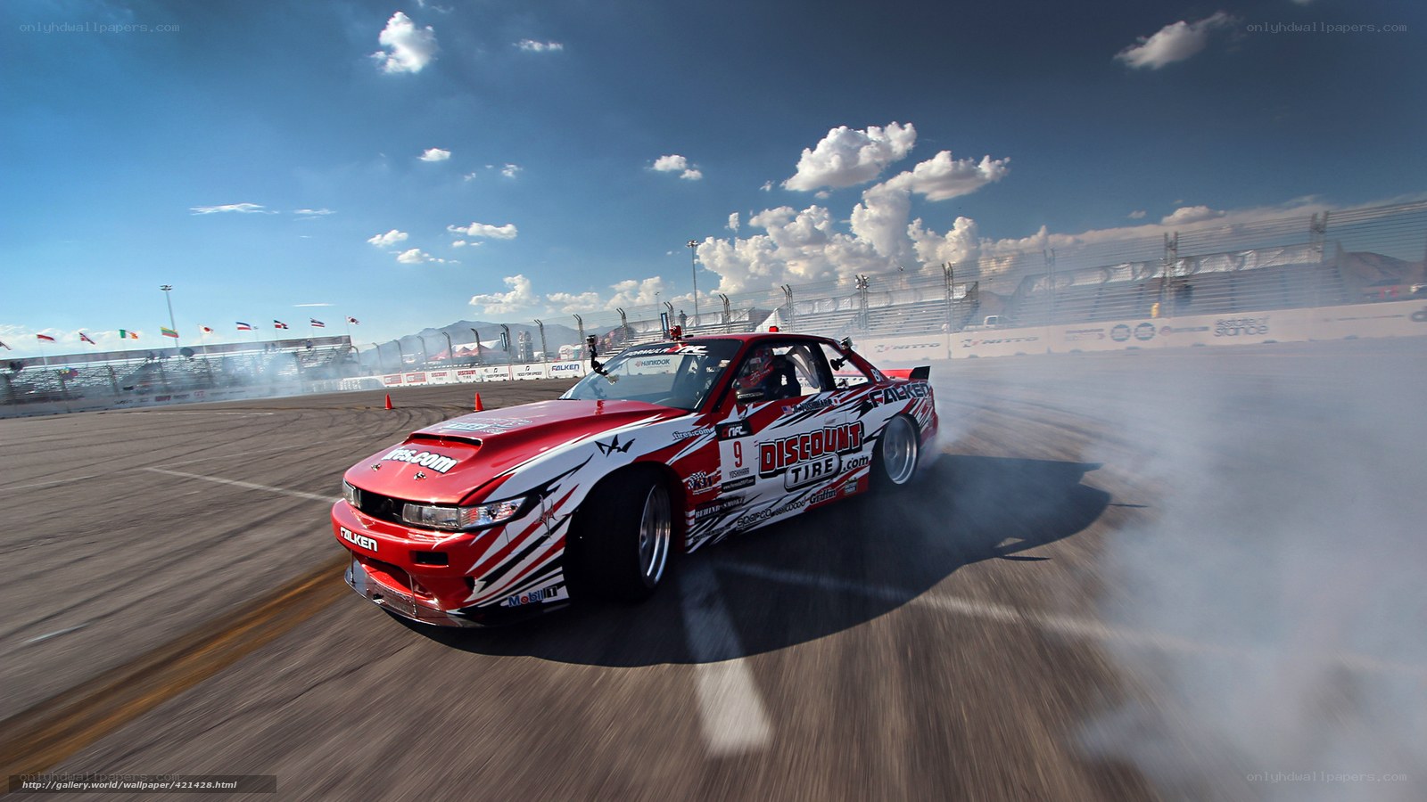 Red drift car on racetrack