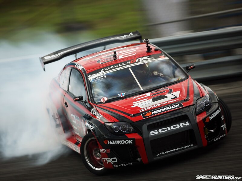 red drift car on track