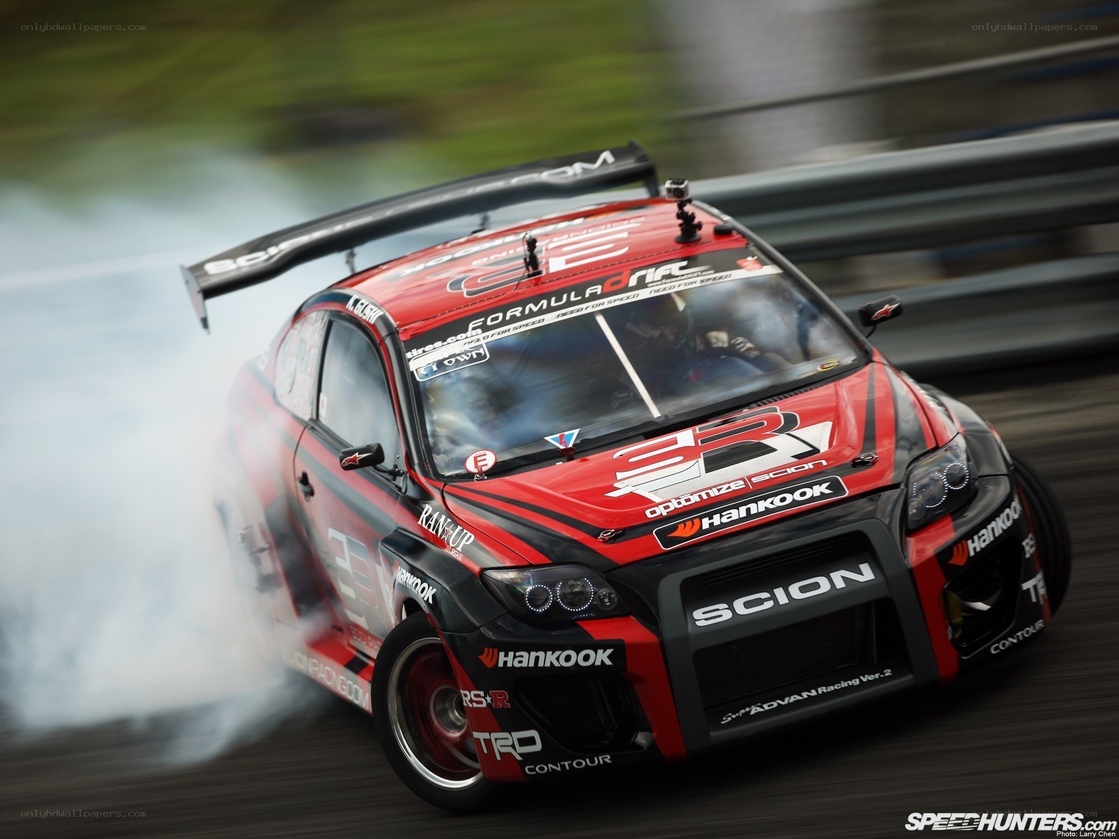 red drift car on track