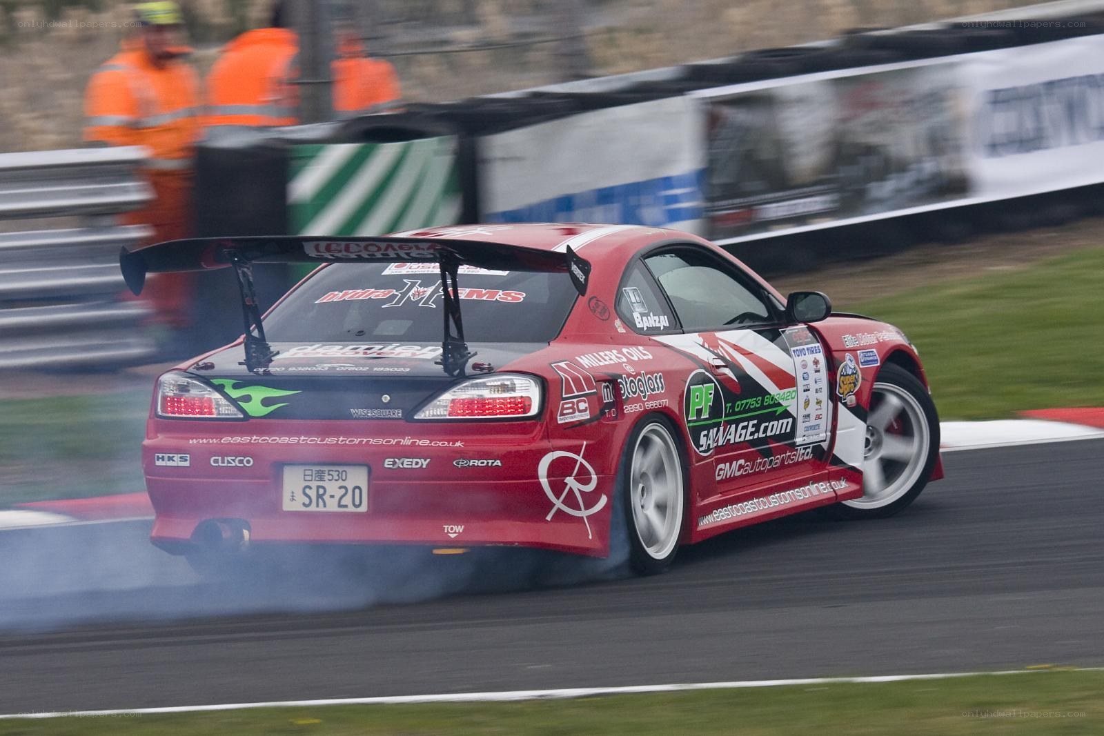 Red drift car on track