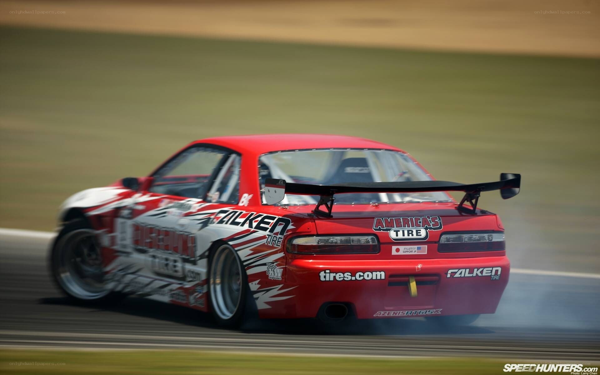 red drift car on track