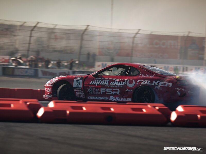 Red drift car on track