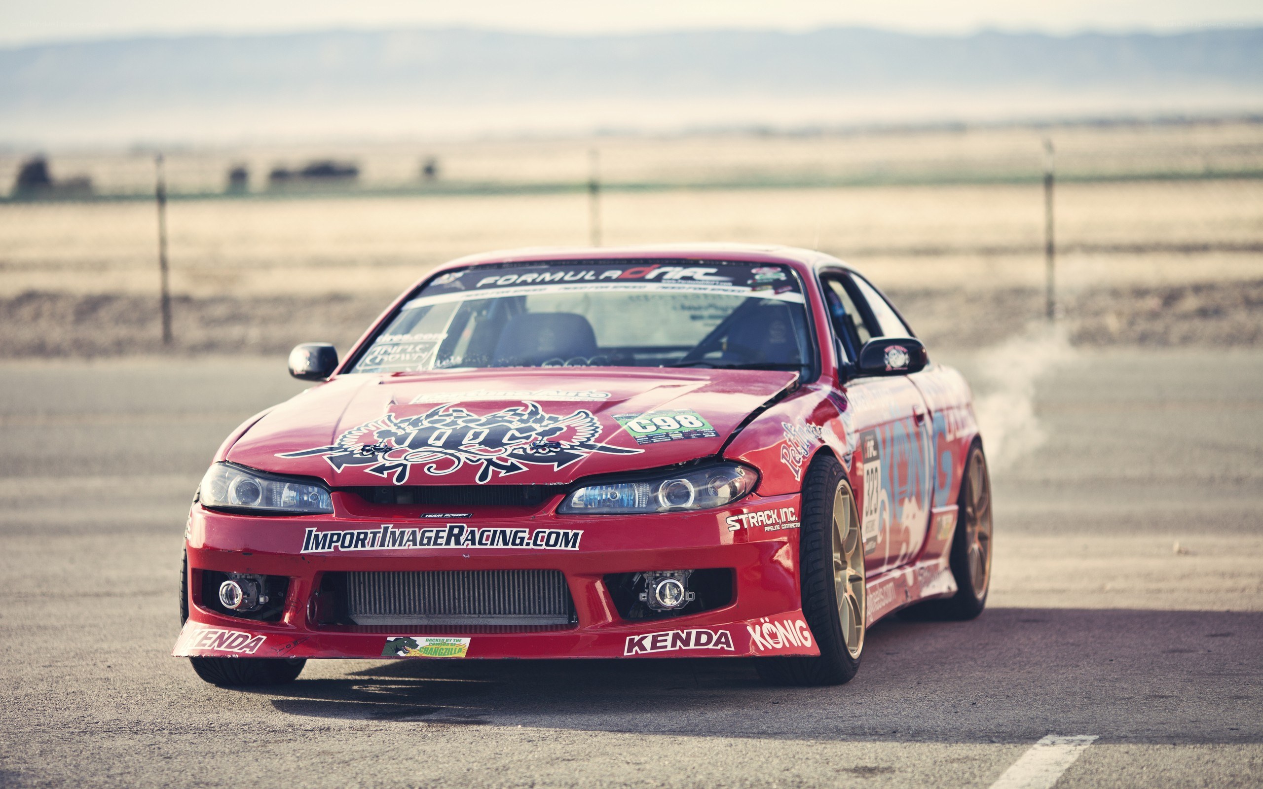 Red drift car on track