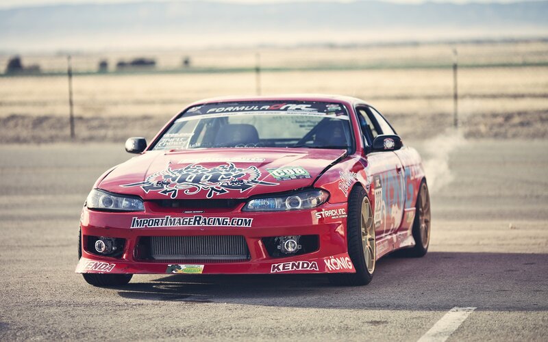 red drift car on track
