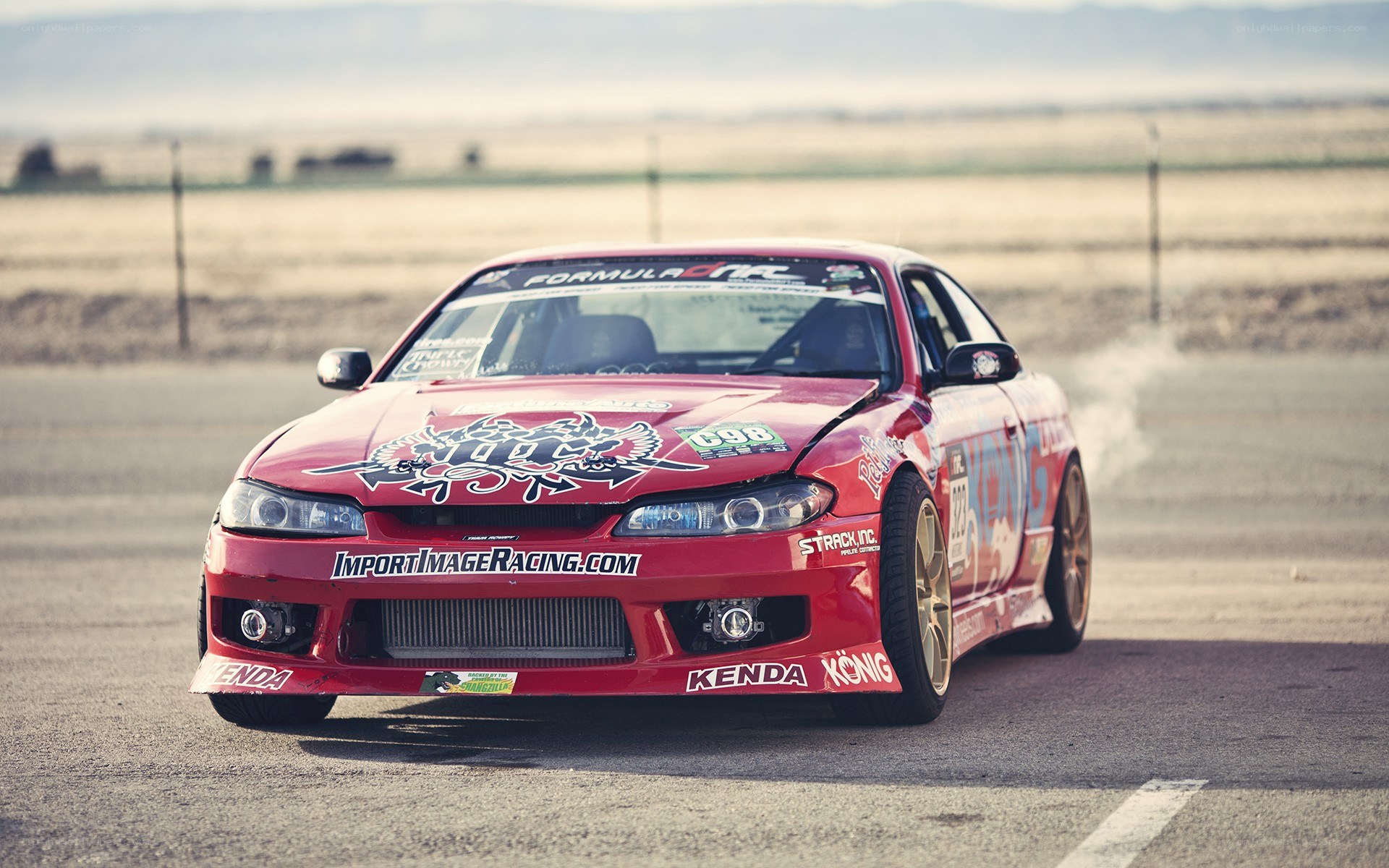 red drift car on track