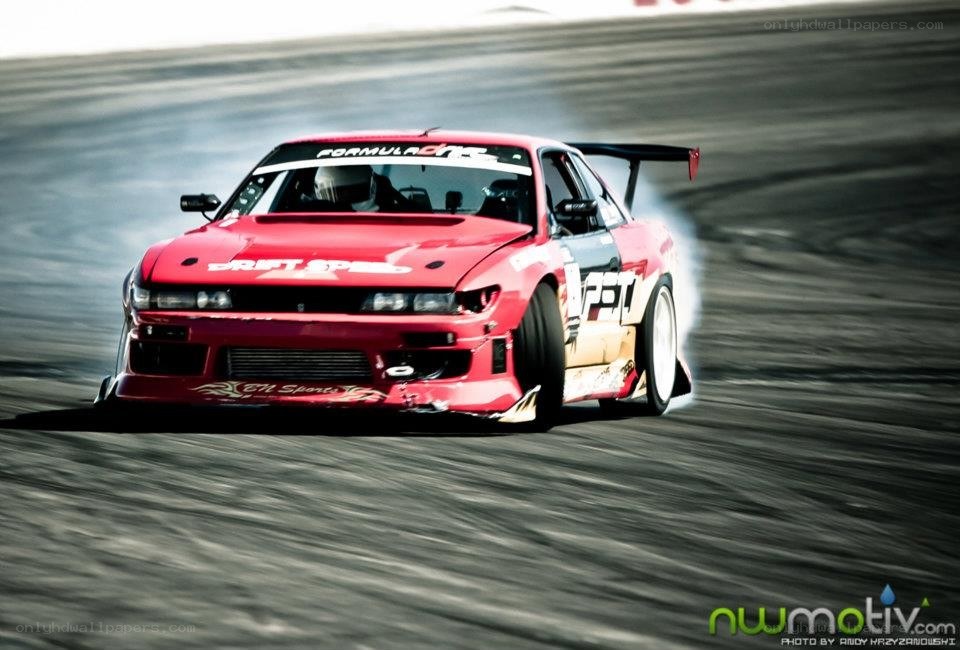 Red drift car on track
