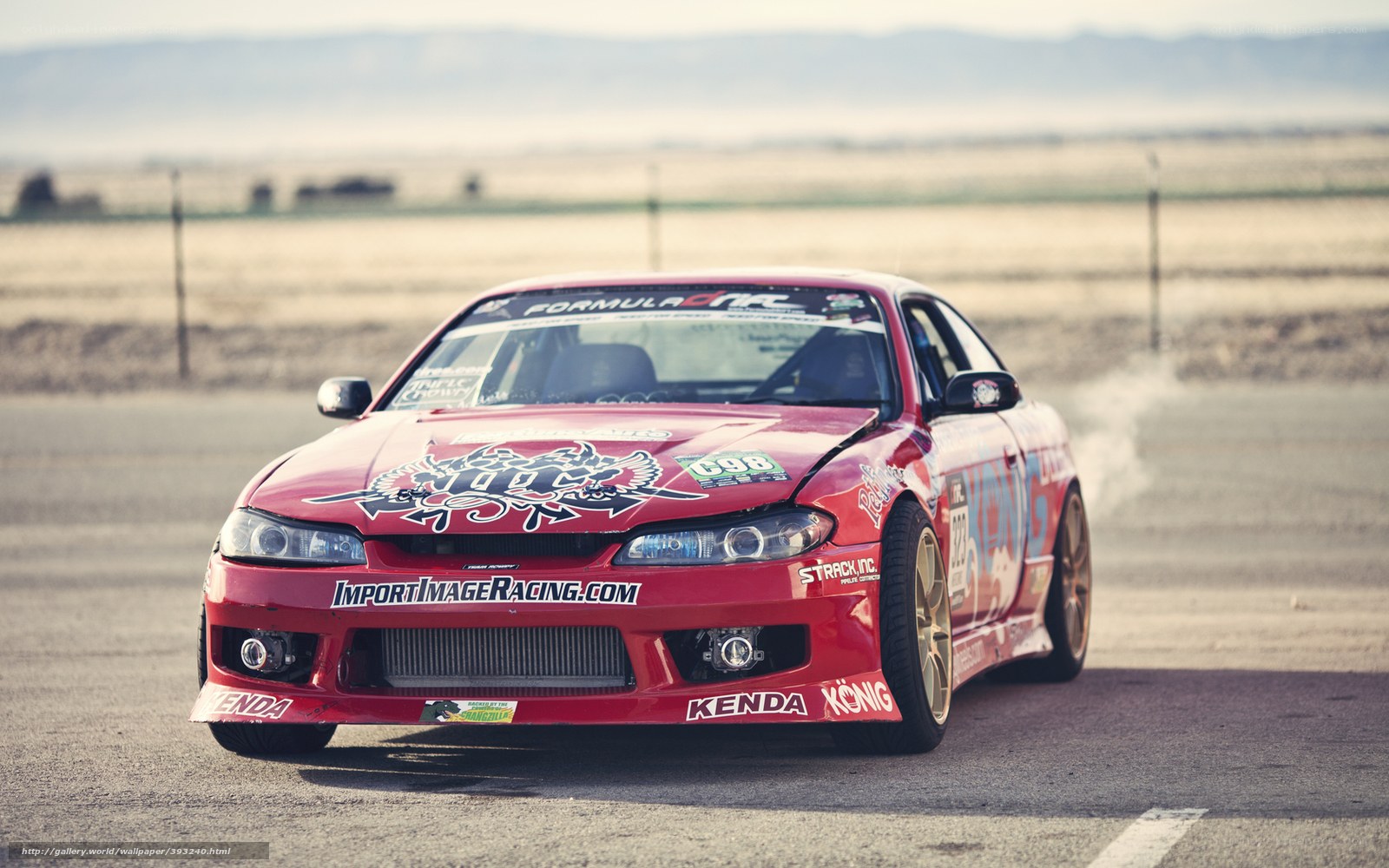 Red drift car on track