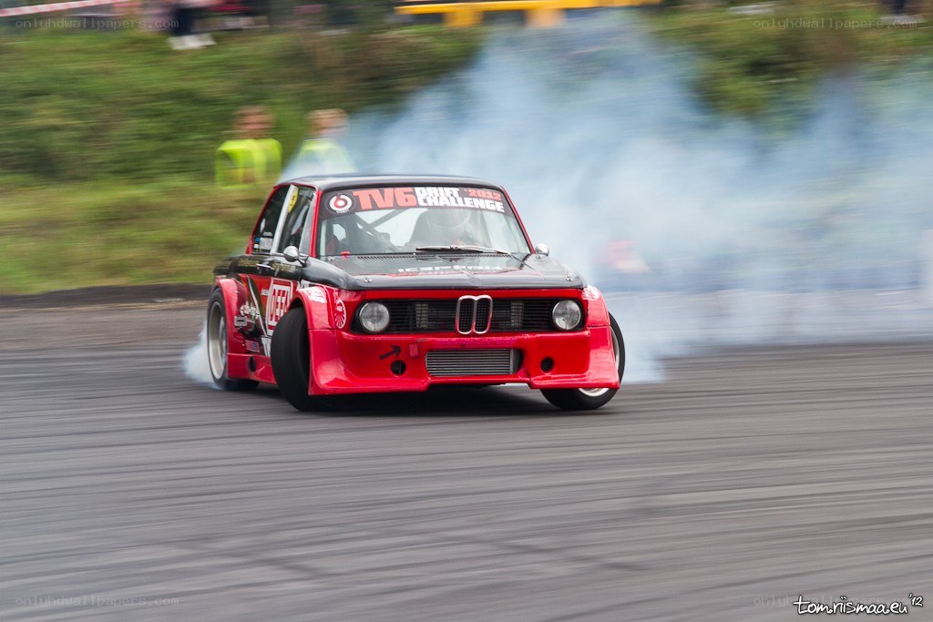 Red drift car on track