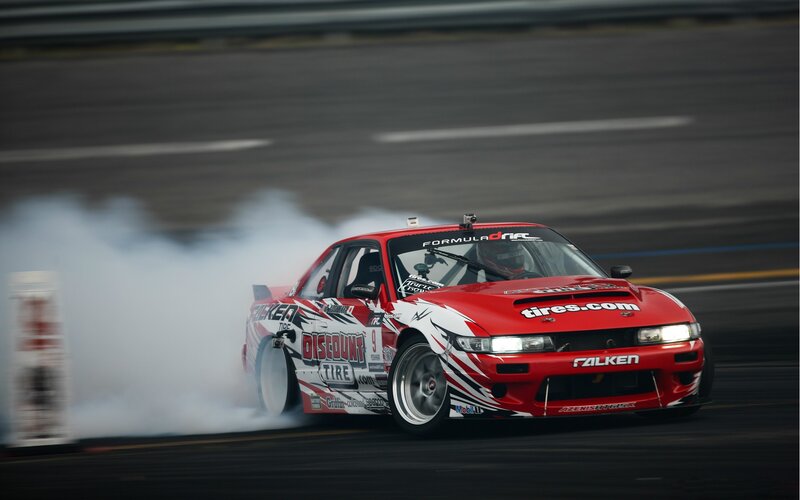 Red drift car on track