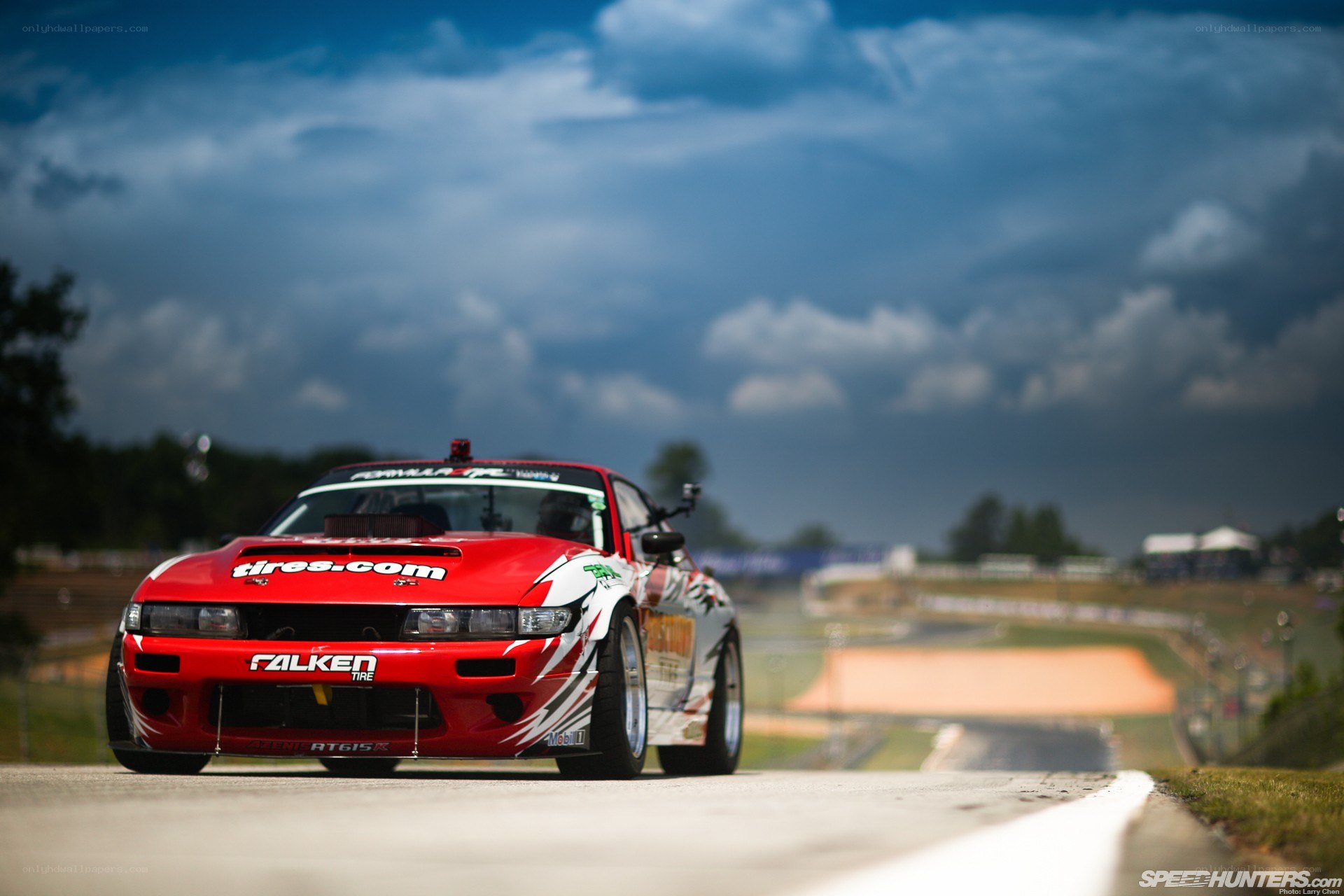 Red drift car on track