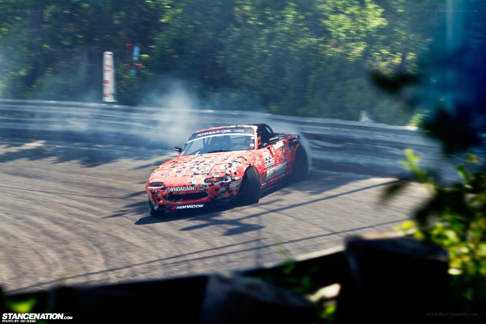 Red drift car on track