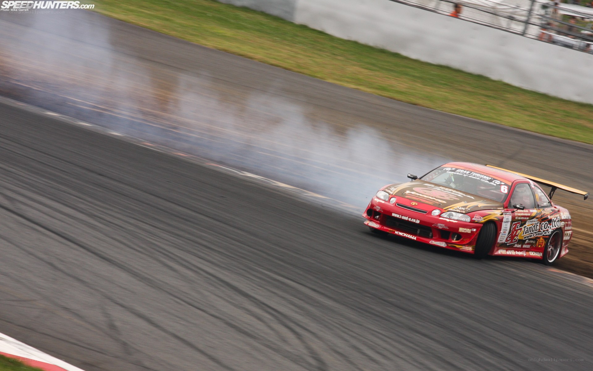 Red drift car on track
