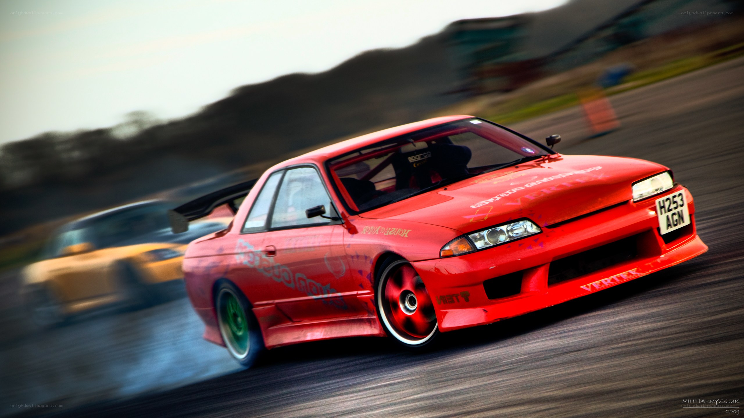 Red drift car on track
