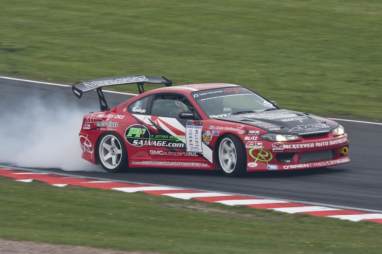red drift car on track