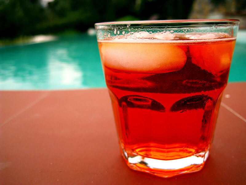 Red drink by the pool