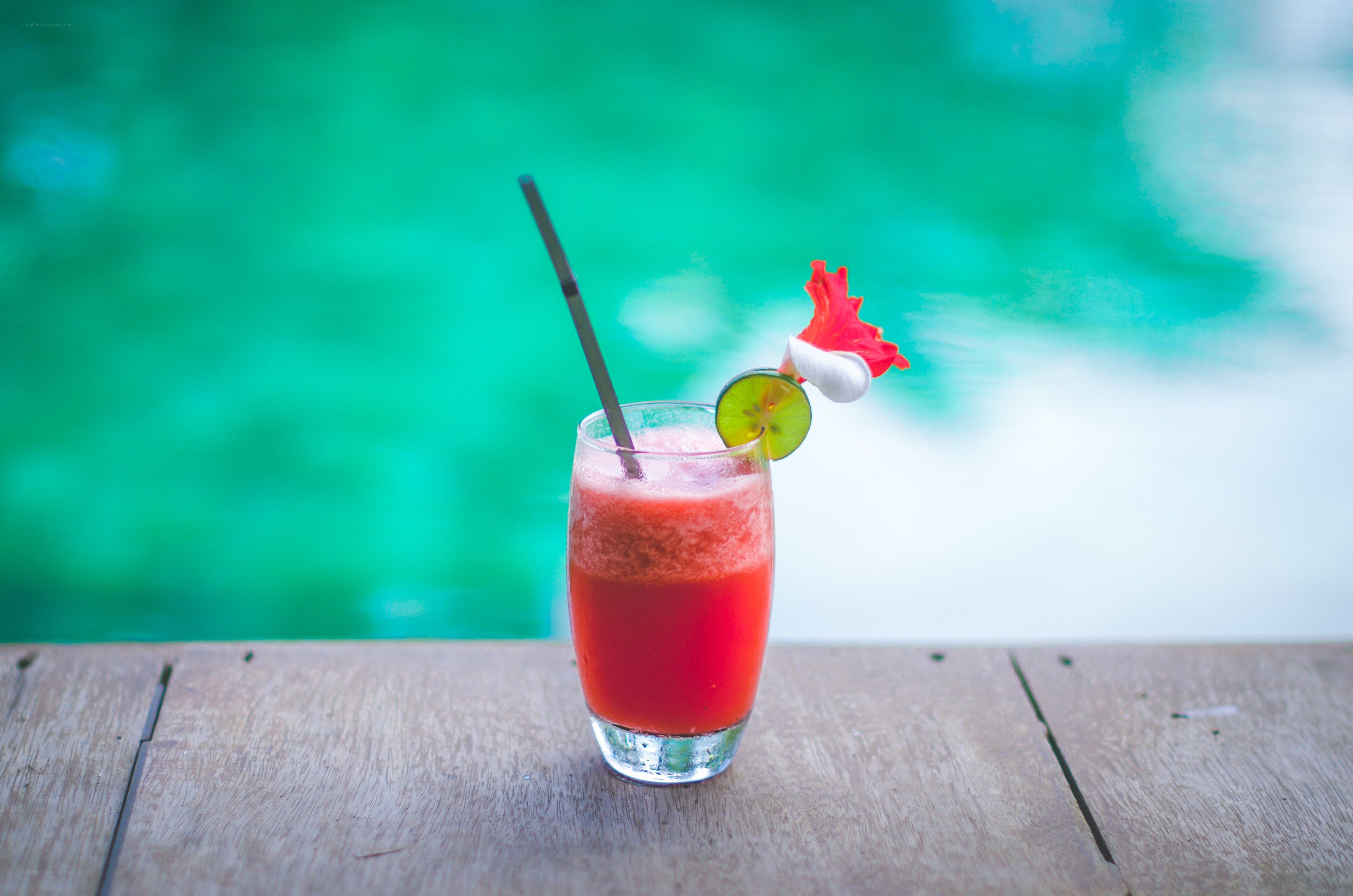 Red drink by the pool