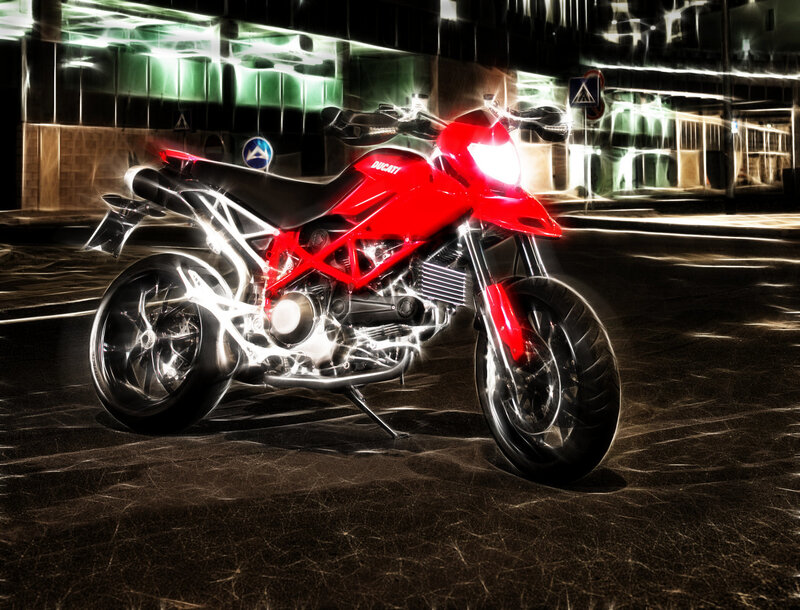 Red Ducati motorcycle at night