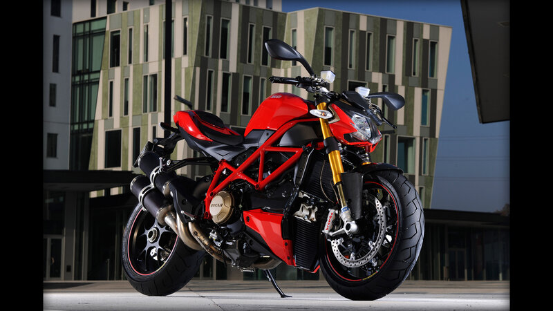 Red Ducati motorcycle in city