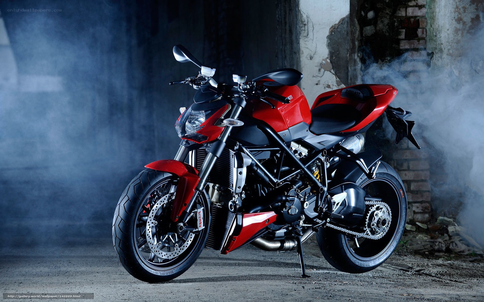 Red Ducati motorcycle in smoke