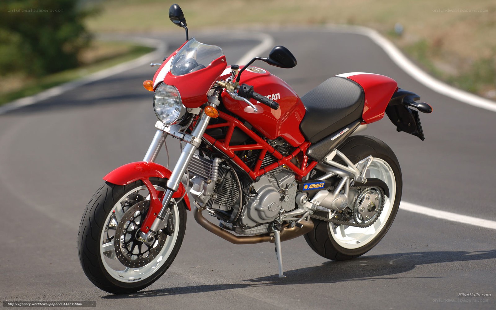 Red Ducati motorcycle on road