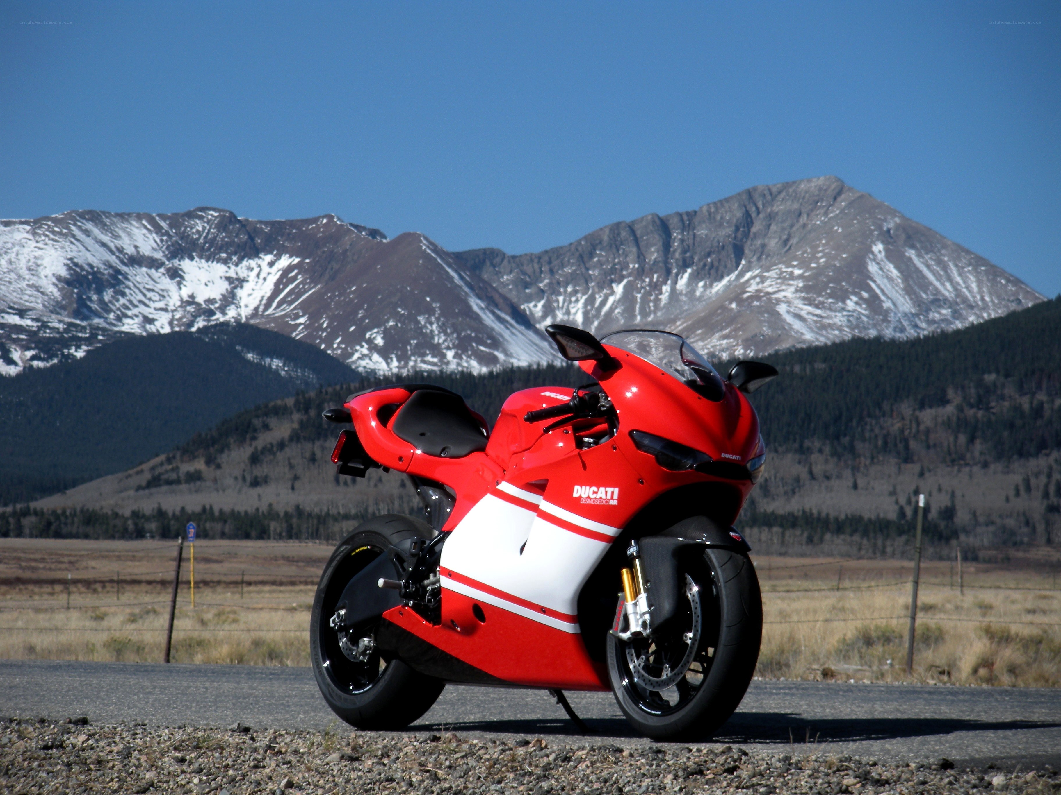 Red Ducati motorcycle on road