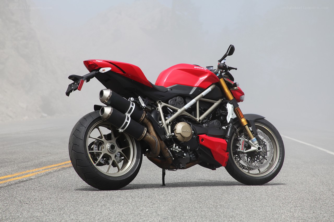 Red Ducati motorcycle on road