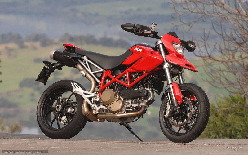 Red Ducati motorcycle on road