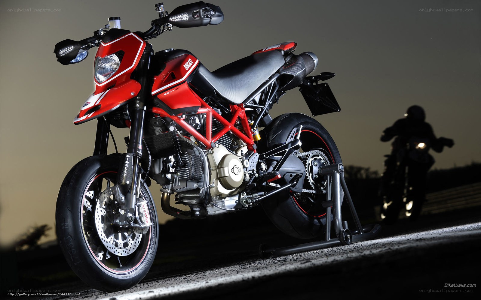 Red Ducati motorcycle on stand