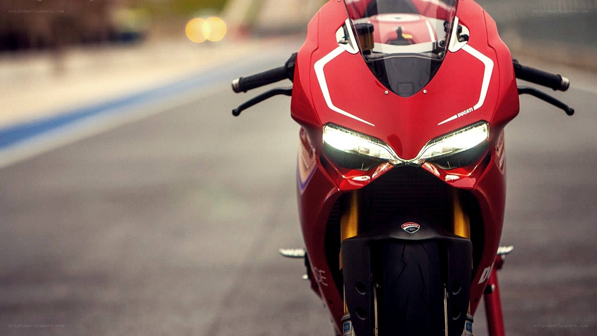 Red Ducati motorcycle on track