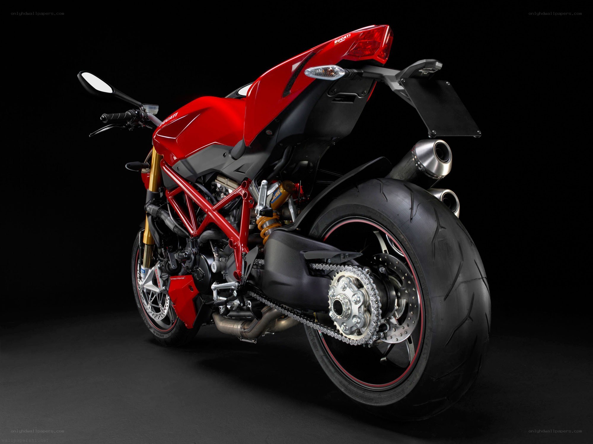 Red Ducati motorcycle rear view
