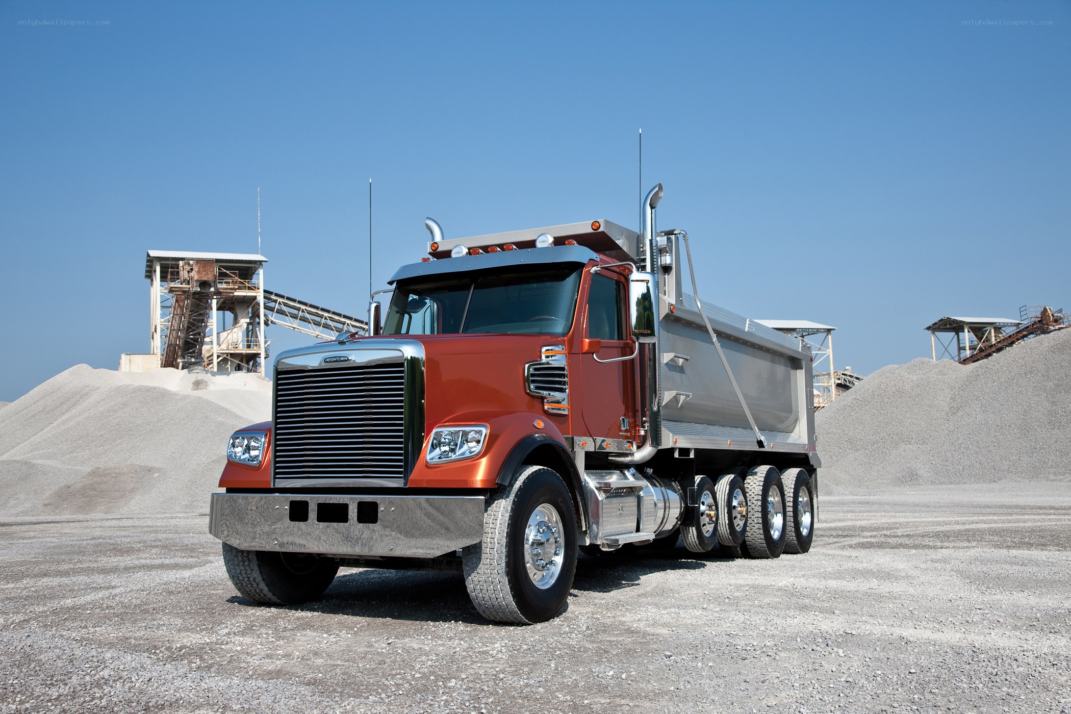 Red dump truck at quarry