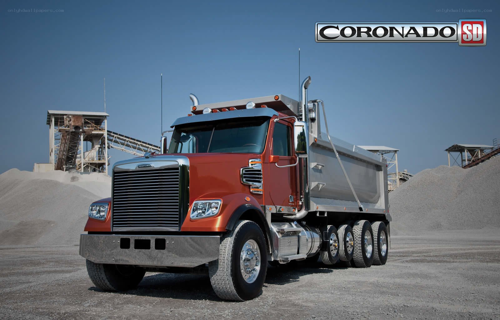 Red dump truck at quarry