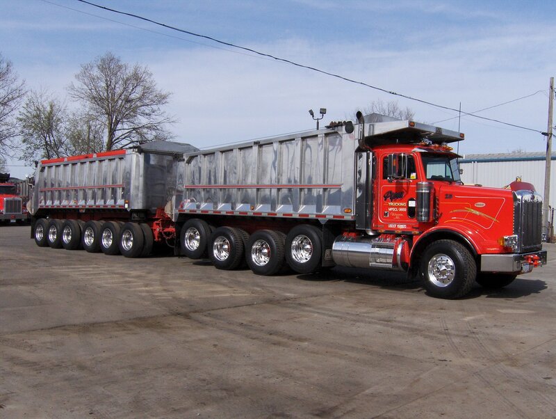 red dump truck with trailers