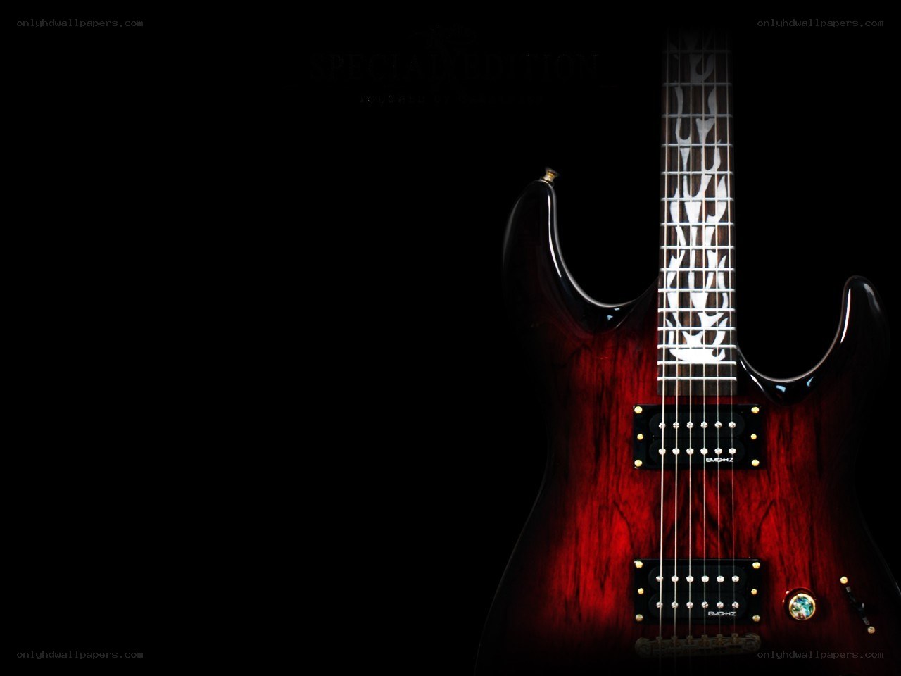 red electric guitar on black