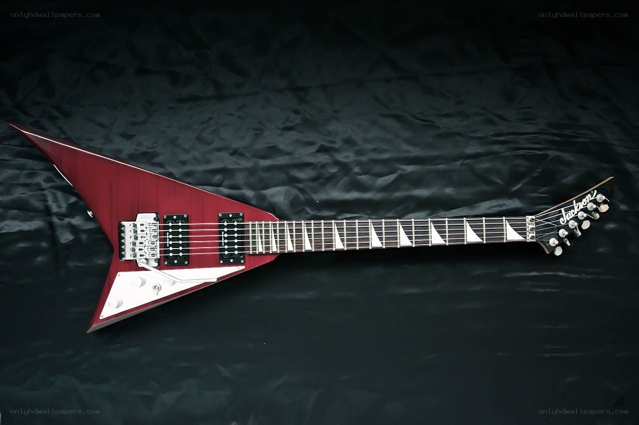red electric guitar on black