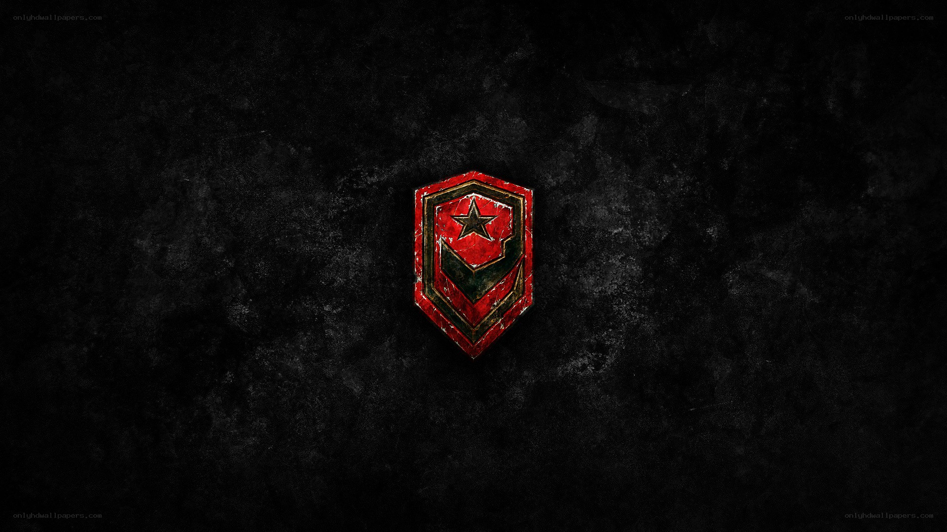 red emblem on dark background